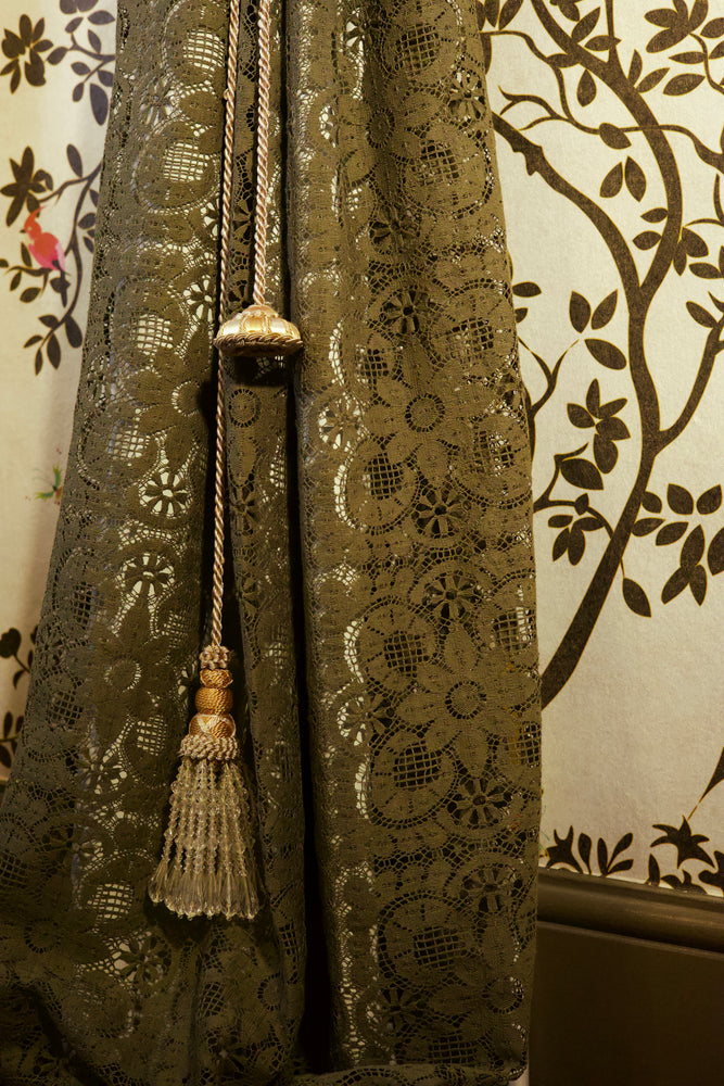 A pair of vintage curtain tie backs