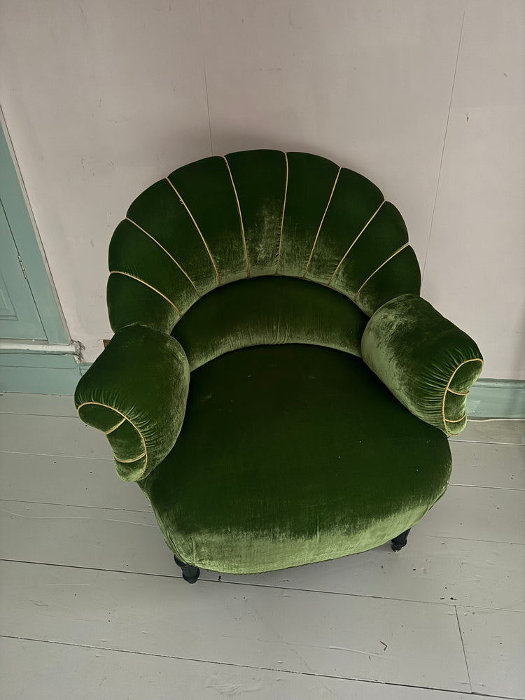 Vintage green velvet armchair