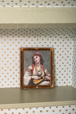 Antique portrait painting in glass frame