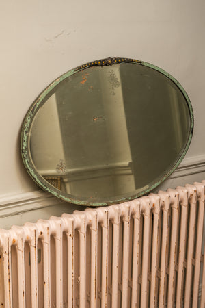 Antique floral oval mirror