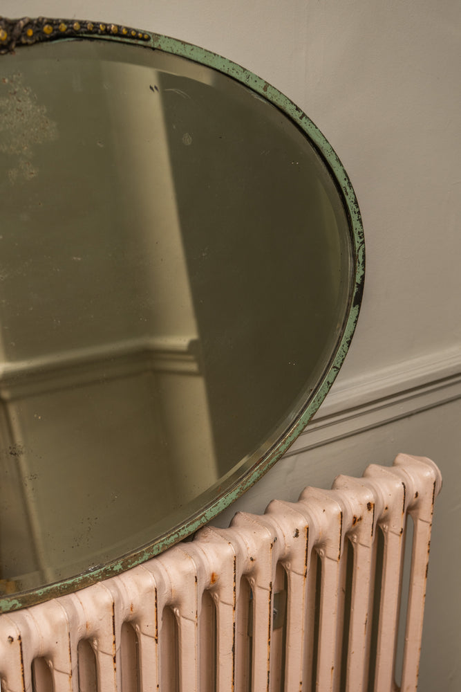 Antique floral oval mirror