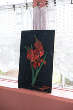 Antique red Gladioli painting on a black board