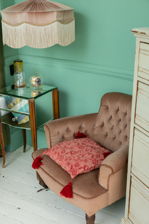 Vintage red cushion with red tassels