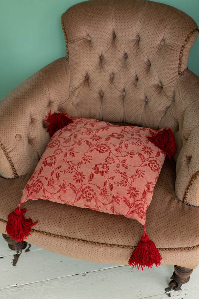 Vintage red cushion with red tassels