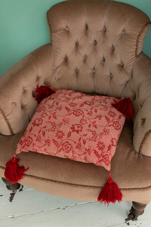 Vintage red cushion with red tassels
