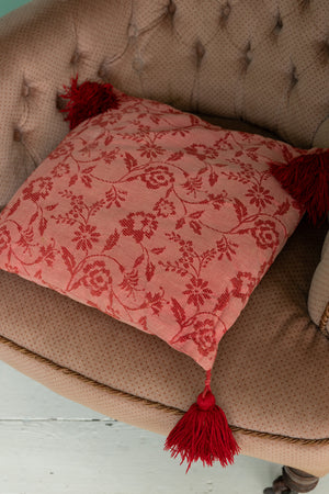 Vintage red cushion with red tassels