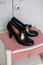 Chie Mihara black patent lace up shoes