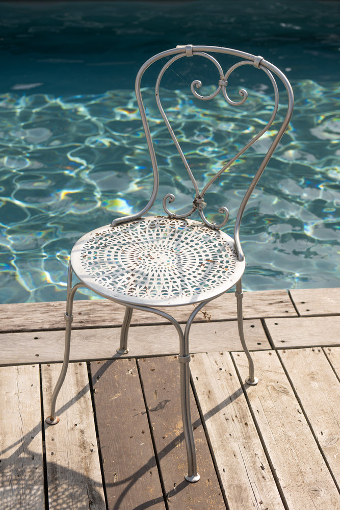 Antique silver metal chairs