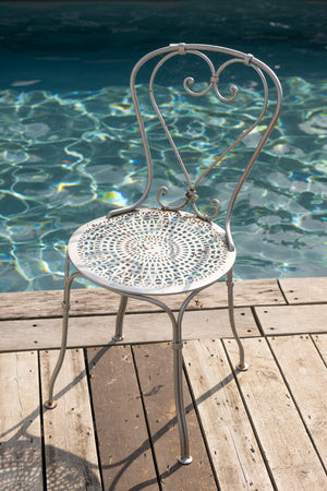 Antique silver metal chairs