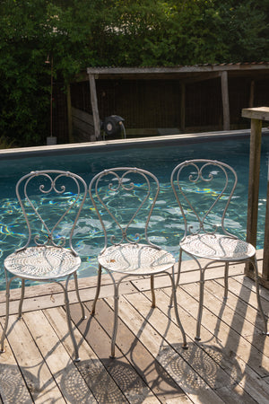 Antique silver metal chairs