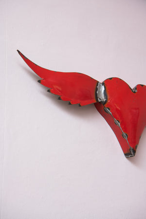 Vintage small red heart with wings