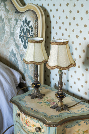 A pair of antique lamps