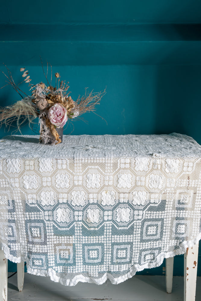 Round vintage white crochet tablecloth