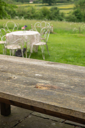 Wooden oak garden table with 2x wooden oak benches