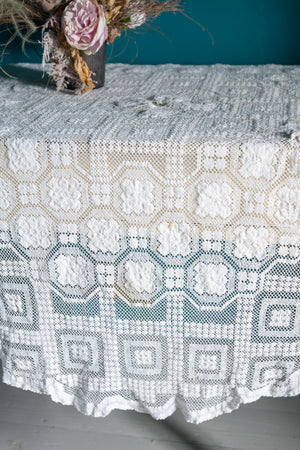 Round vintage white crochet tablecloth