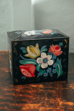 Antique black floral tin