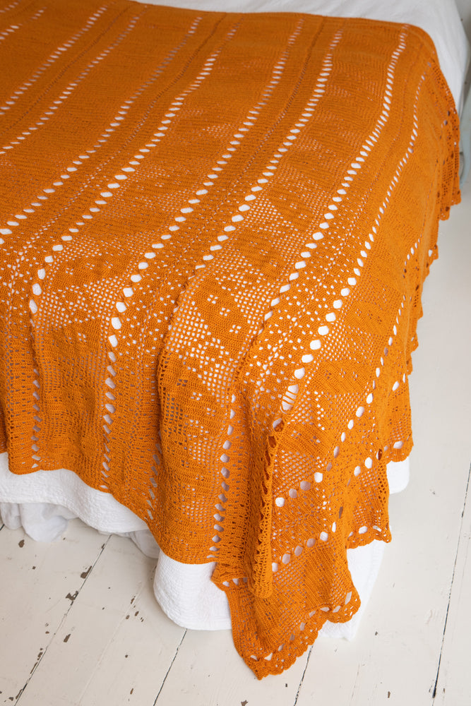 Vintage burnt orange crochet bedspread