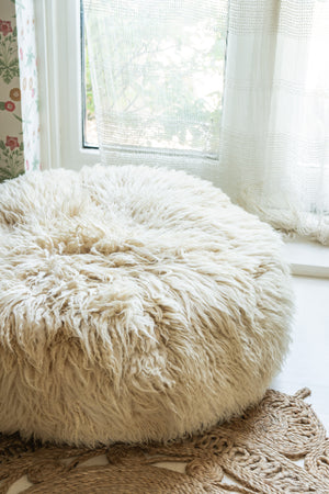 Vintage cream round pouffe