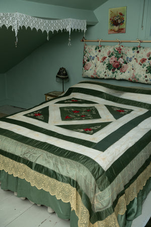 Vintage green lace and satin and ribbon superking bedspread