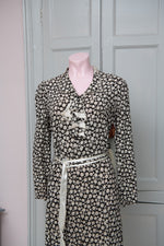 Vintage 1930s black & white rayon floral dress with ruffle and belt.