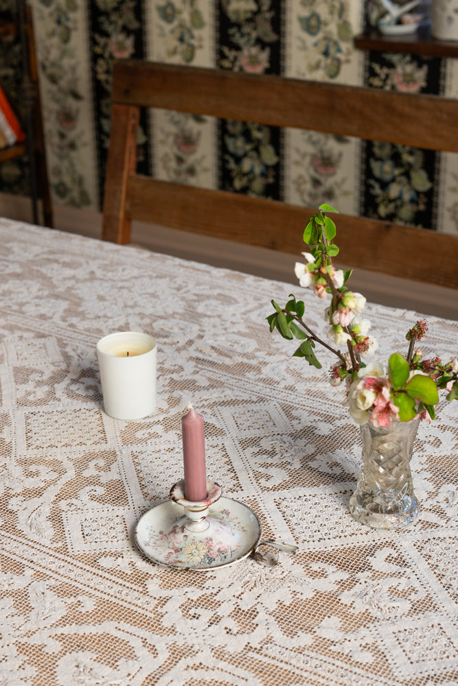 Antique floral candle holder