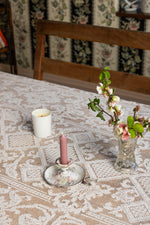 Antique floral candle holder