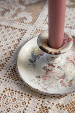 Antique floral candle holder