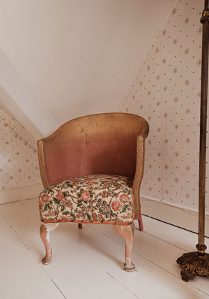 Vintage pink Lloyd Loom chair