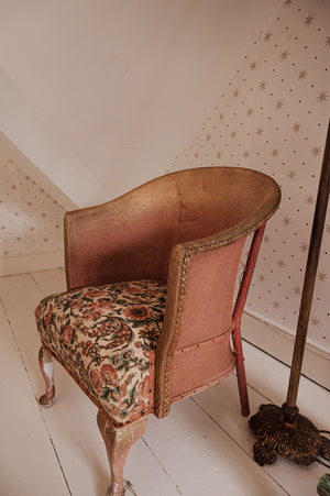 Vintage pink Lloyd Loom chair