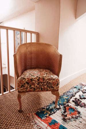 Vintage pink Lloyd Loom chair