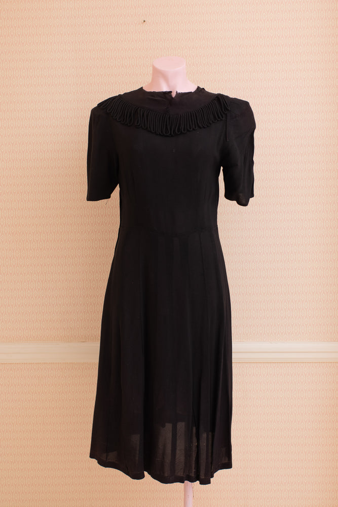 Original black crepe short sleeve dress with fringe collar