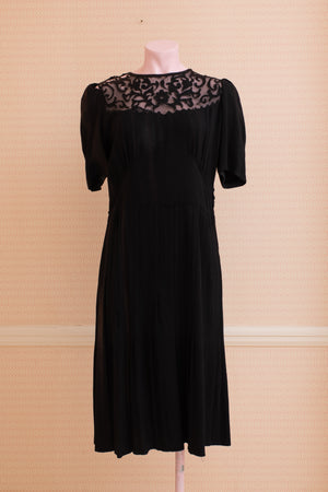 Damaged and discoloured black crepe original 40s dress