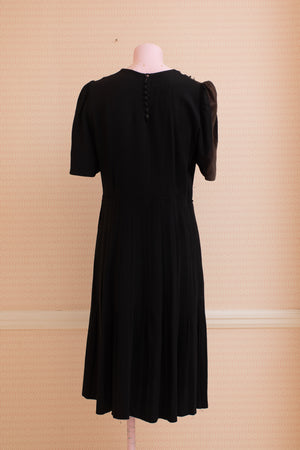 Damaged and discoloured black crepe original 40s dress