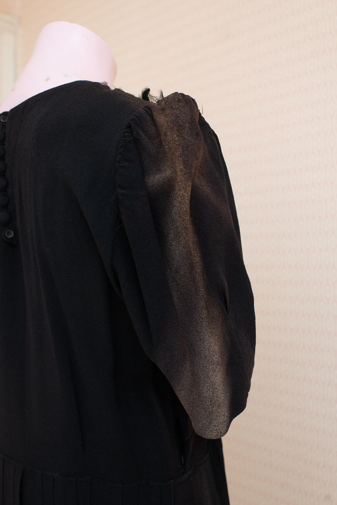 Damaged and discoloured black crepe original 40s dress