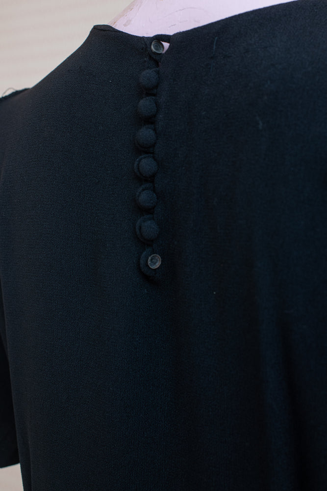 Damaged and discoloured black crepe original 40s dress