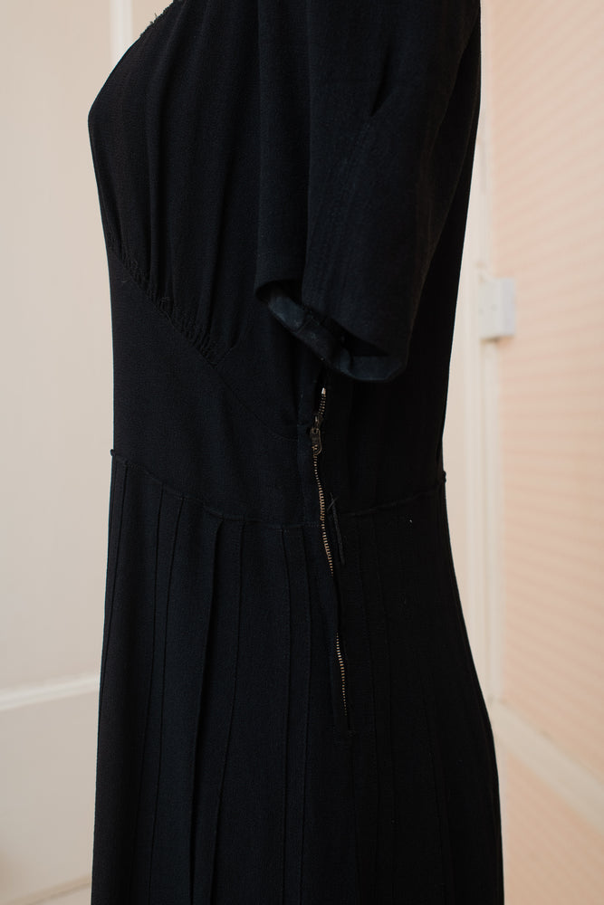 Damaged and discoloured black crepe original 40s dress