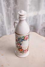 Antique floral flask