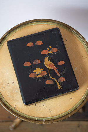 Antique box with painted birds