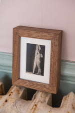 Small antique nude in wooden frame