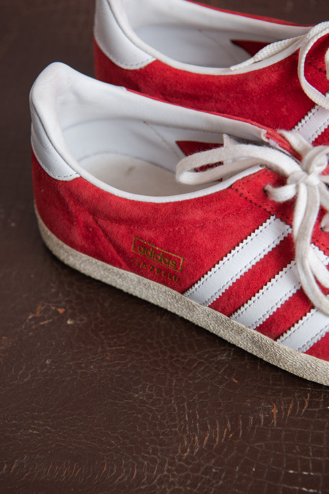Red suede adidas trainers top