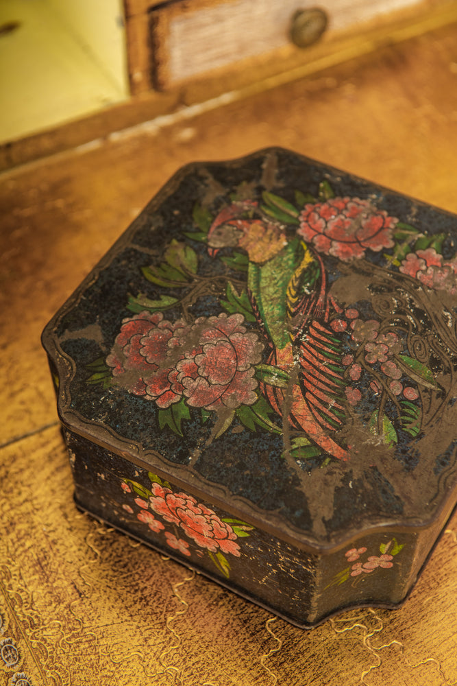 Antique black floral and bird tin